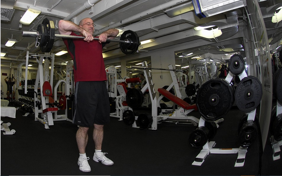 a senior lifting weights